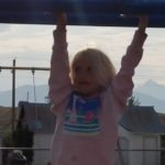 young girl playing outside